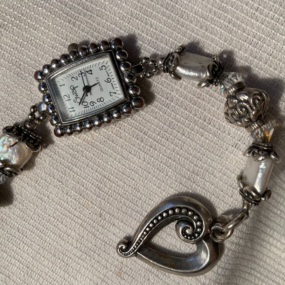 Preowned mint condition woman working Swap watch